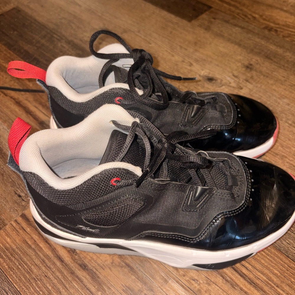 Jordan Black and White Sneakers with Red Highlights